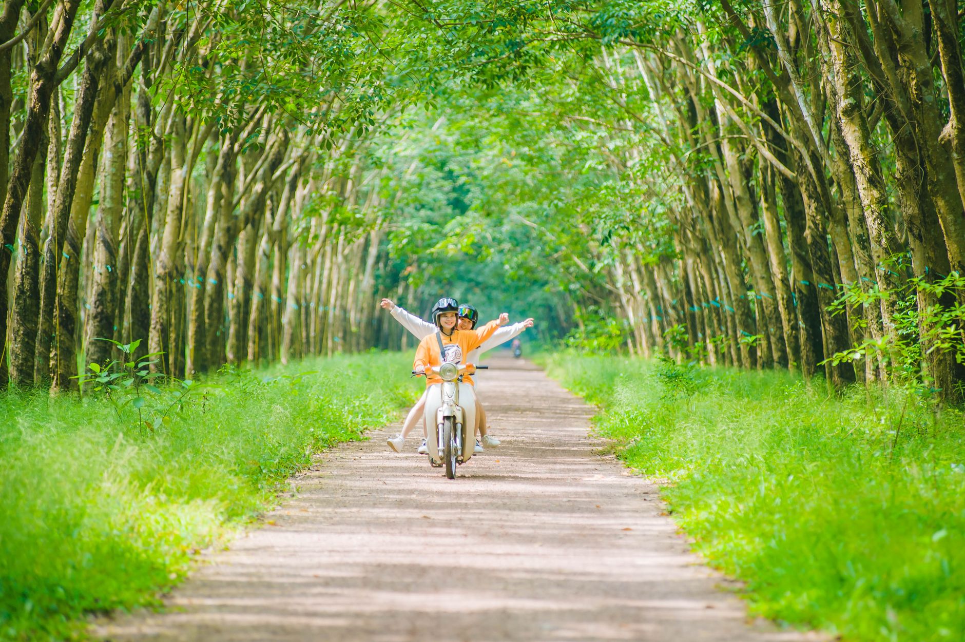 two women on a scooter